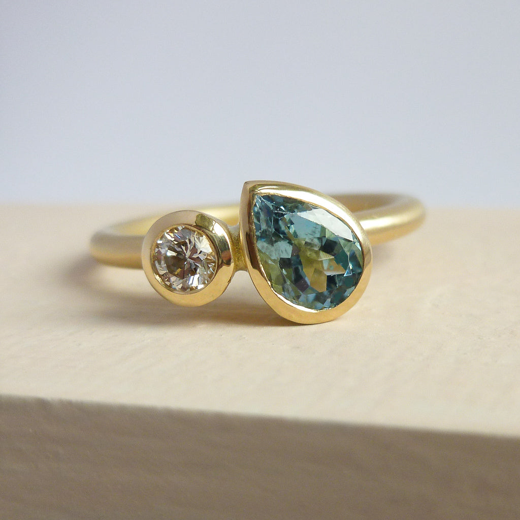 Contemporary, unique and modern aquamarine and diamond 18ct gold ring