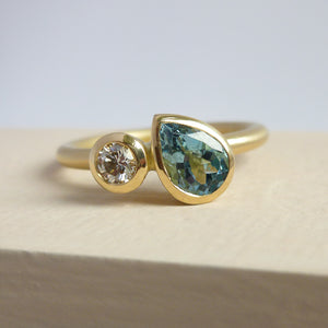 Contemporary, unique and modern aquamarine and diamond 18ct gold ring