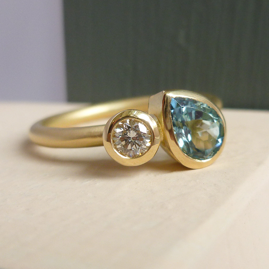 Contemporary, unique and modern aquamarine and diamond 18ct gold ring