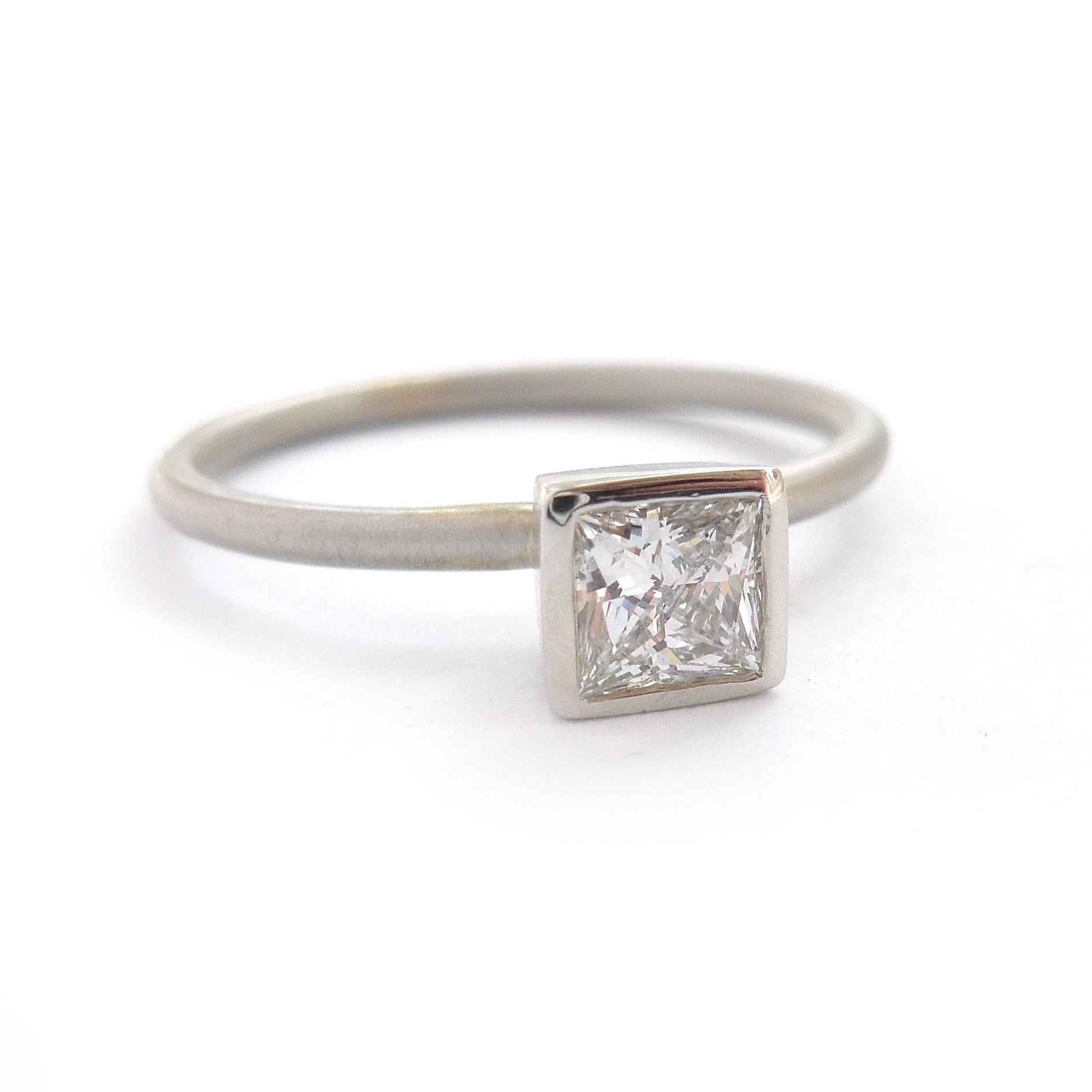 Platinum and square diamond engagement ring