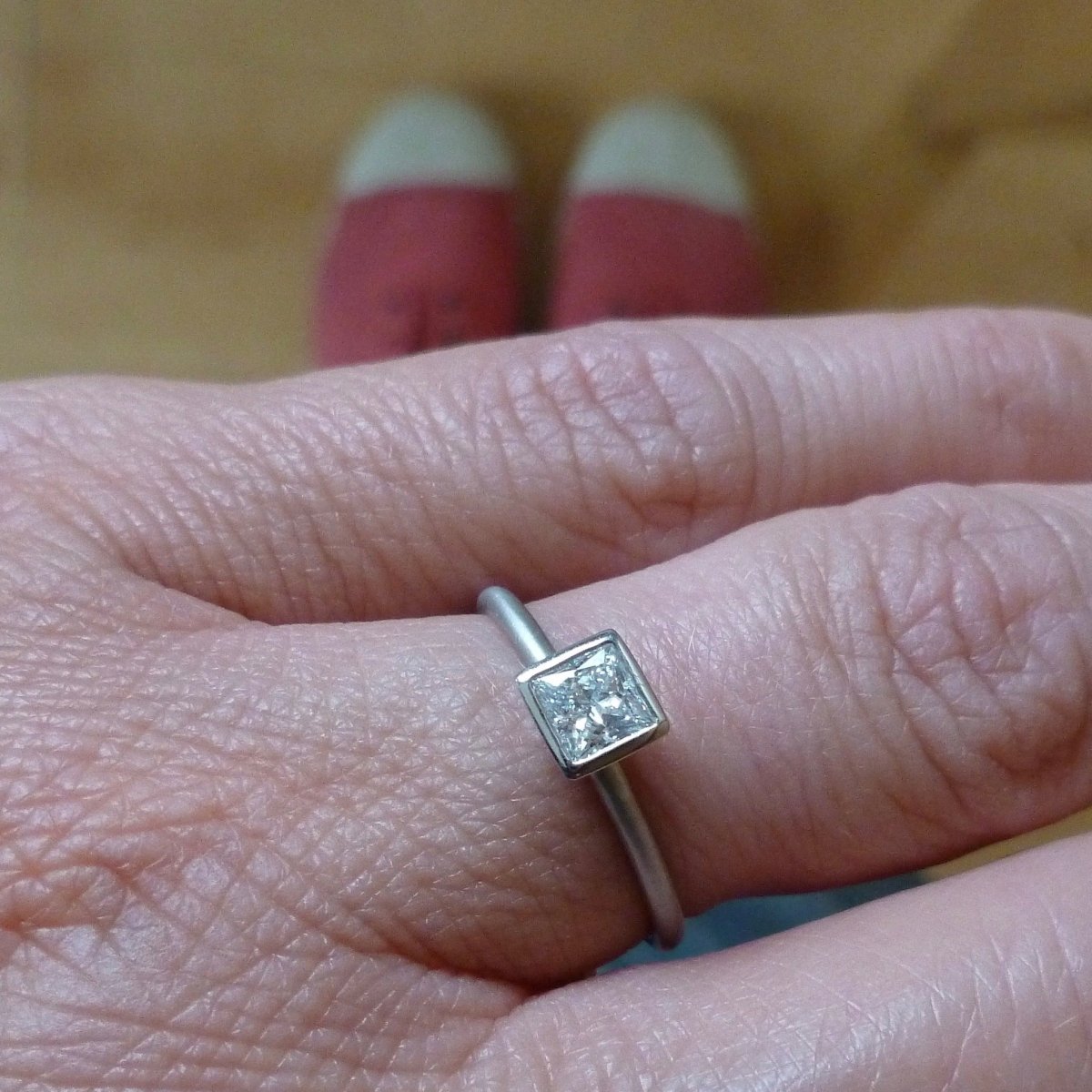 Platinum and square diamond engagement ring