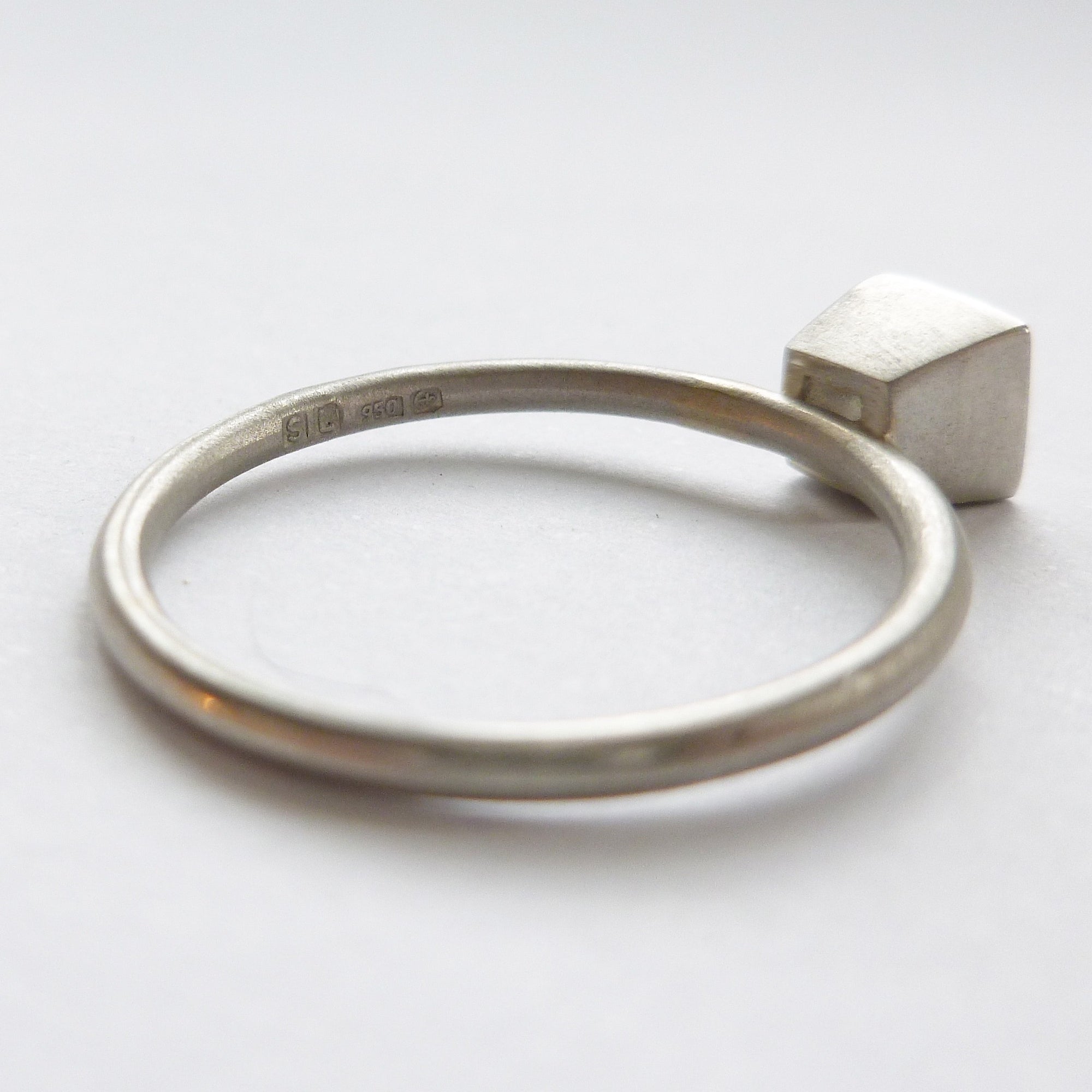Platinum and square diamond engagement ring
