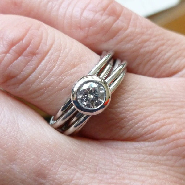 Contemporary bespoke Russian style Platinum diamond ring Sue Lane. Multi band ring or interlocking ring.