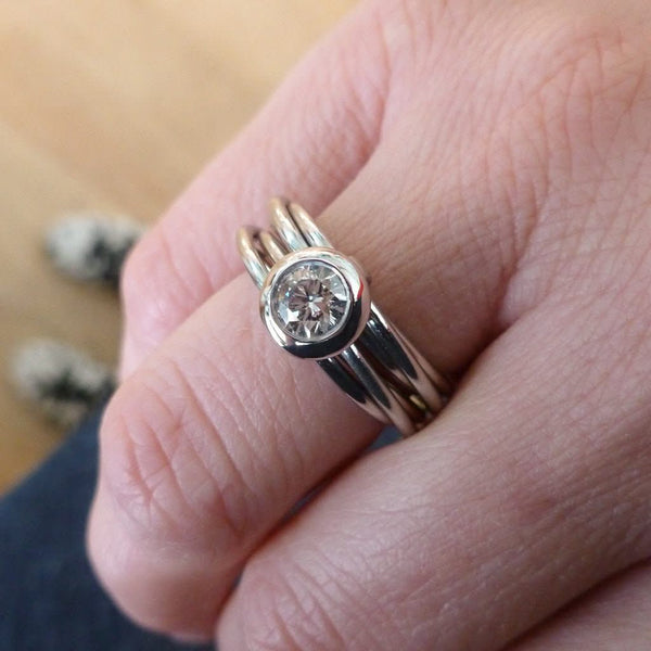 Contemporary bespoke Russian style Platinum diamond ring Sue Lane. Multi band ring or interlocking ring.