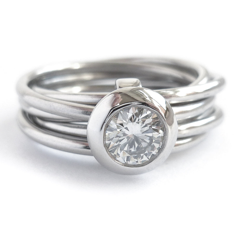 Contemporary bespoke Russian style Platinum diamond ring Sue Lane. Multi band ring or interlocking ring.