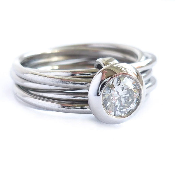 Contemporary bespoke Russian style Platinum diamond ring Sue Lane. Multi band ring or interlocking ring.