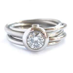 Contemporary bespoke Russian style Platinum diamond ring Sue Lane. Multi band ring or interlocking ring.