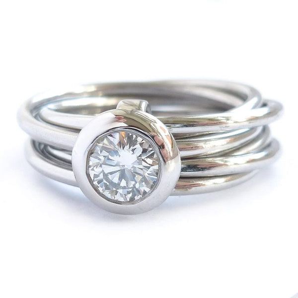 Contemporary bespoke Russian style Platinum diamond ring Sue Lane. Multi band ring or interlocking ring.