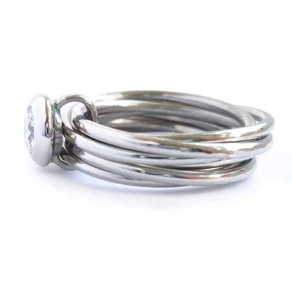 Contemporary bespoke Russian style Platinum diamond ring Sue Lane. Multi band ring or interlocking ring.