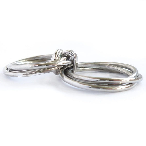Contemporary bespoke Russian style Platinum diamond ring Sue Lane. Multi band ring or interlocking ring.