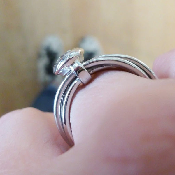 Contemporary bespoke Russian style Platinum diamond ring Sue Lane. Multi band ring or interlocking ring.