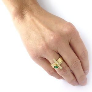 One off contemporary ring with lovely emerald and pave set diamonds. Totally bespoke and unique.