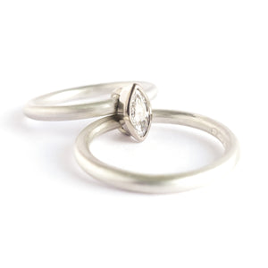 Contemporary unique and modern two band silver and gold marquise diamond stacking ring handmade Sue Lane jewellery. Perfect wedding and engagement ring.