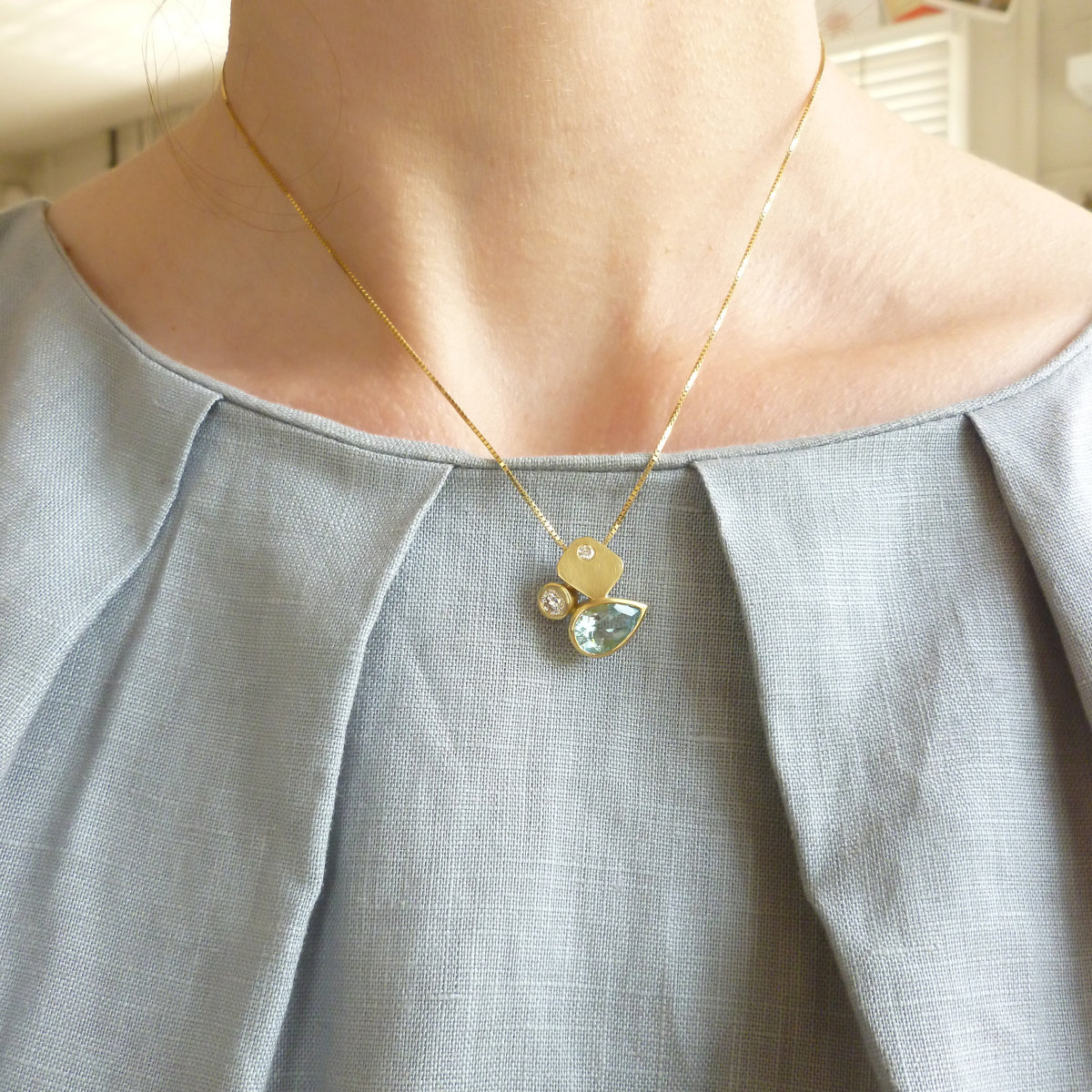 Contemporary modern unique 18ct gold diamond necklace aquamarine handmade by sue lane