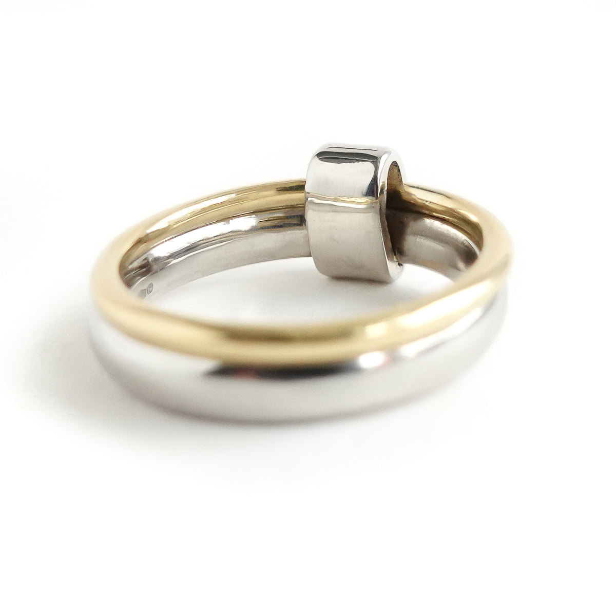 Contemporary platinum and 18ct yellow gold two band ring with diamonds