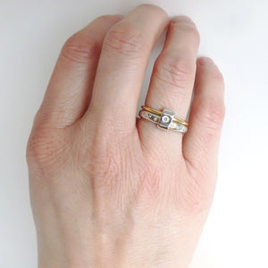 Contemporary platinum and 18ct yellow gold two band ring with diamonds