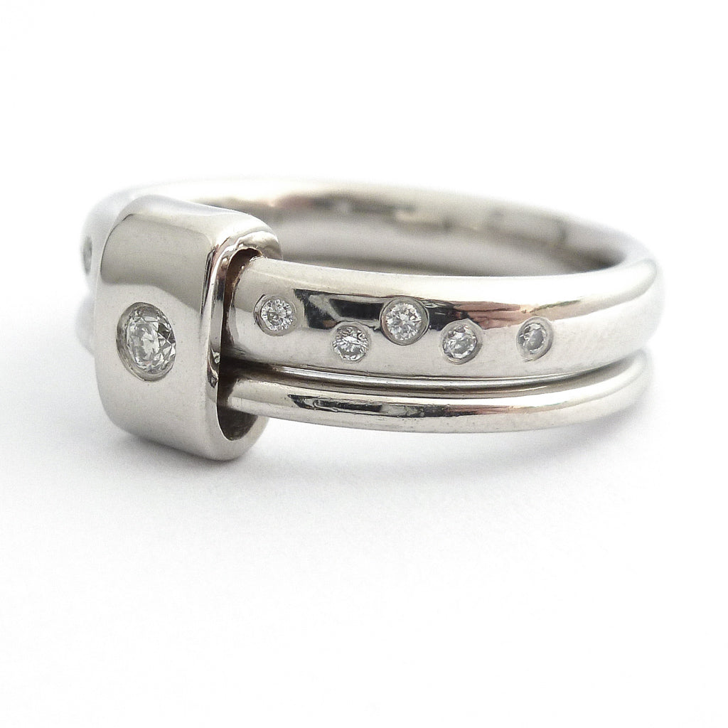 Platinum and diamond two band ring - modern, unique, contemporary. Multi band ring or interlocking ring, sometimes called double band ring too.
