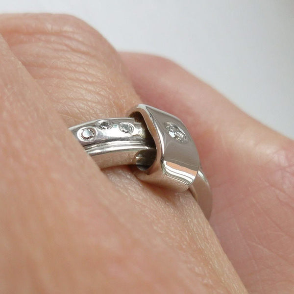 Platinum and diamond two band ring - modern, unique, contemporary. Multi band ring or interlocking ring, sometimes called double band ring too.