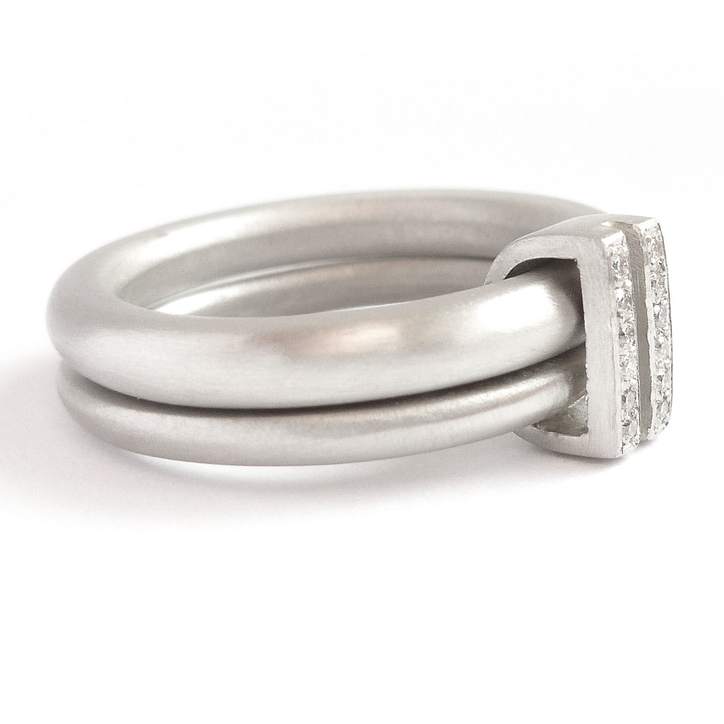 Platinum two band ring with pave set diamonds. Contemporary. By Sue Lane. Multi band ring or interlocking ring, sometimes called double band ring too.