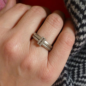 Platinum two band ring with pave set diamonds. Contemporary. By Sue Lane. Multi band ring or interlocking ring, sometimes called double band ring too.