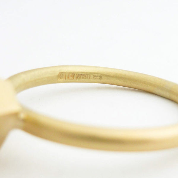 A bespoke orange sapphire and diamond 18ct gold ring. Contemporary and unique. 