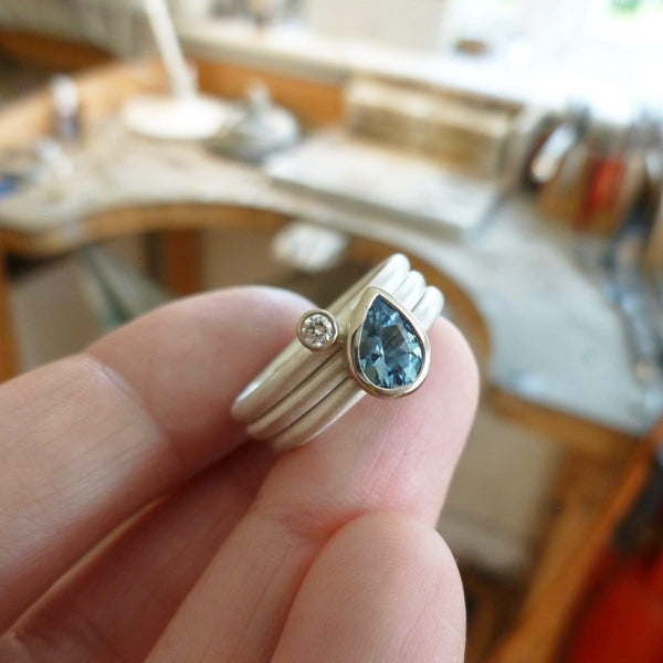 Pink sapphire engagement ring. Handmade, contemporary, unique, bespoke and modern. 