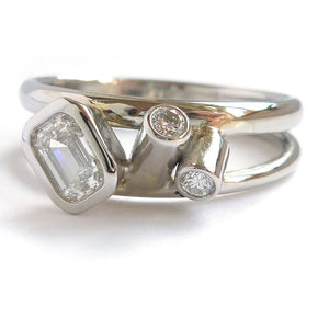 Modern two band platinum ring which can symbolise linking together in relationship