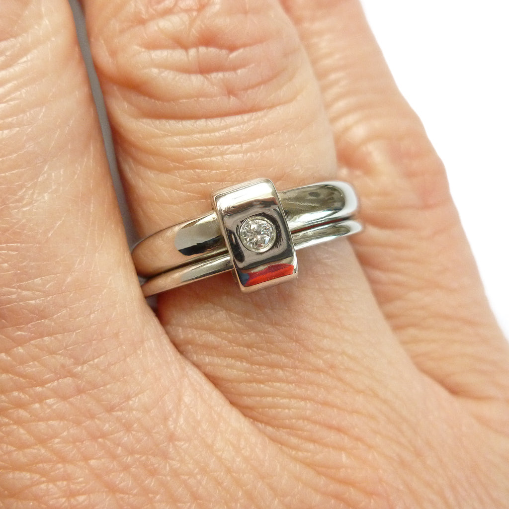 Platinum and diamond two band ring - modern, unique, contemporary by Sue Lane. Multi band ring or interlocking ring, sometimes called double band ring too.
