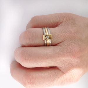 Contemporary jewellery, handmade, modern, bespoke ring by Sue Lane. Triple band ring, interlocking and linked.
