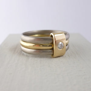 Contemporary jewellery, handmade, modern, bespoke ring by Sue Lane. Triple band ring, interlocking and linked.