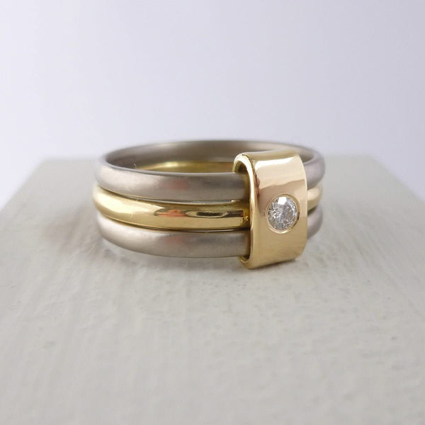 Contemporary jewellery, handmade, modern, bespoke ring by Sue Lane. Triple band ring, interlocking and linked.