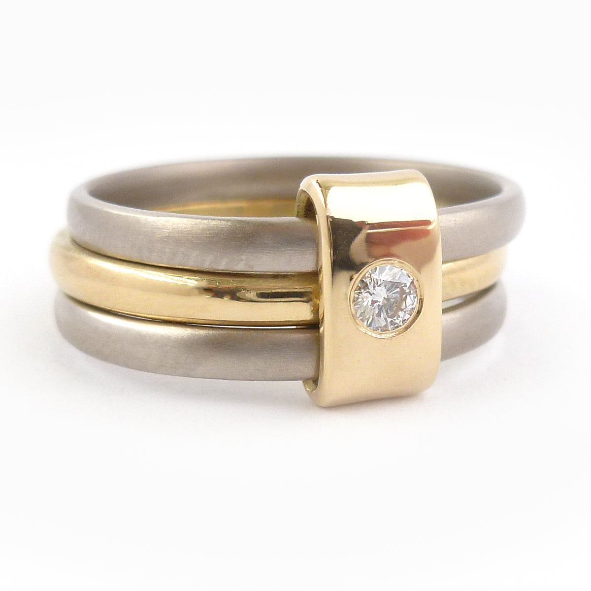 Contemporary jewellery, handmade, modern, bespoke ring by Sue Lane. Triple band ring, interlocking and linked.