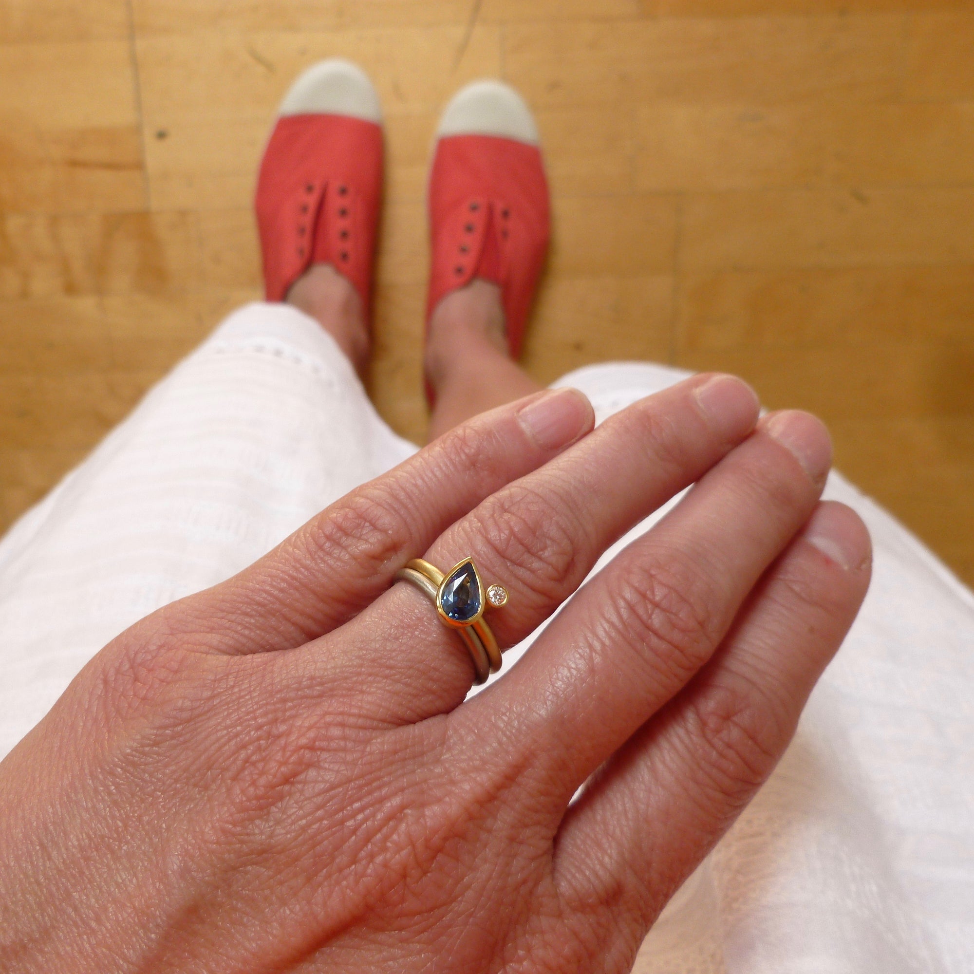 Modern cornflower blue ethically sourced sapphire and diamond stacking ring set by Sue Lane. Multi band ring or interlocking ring, sometimes called double band ring too.