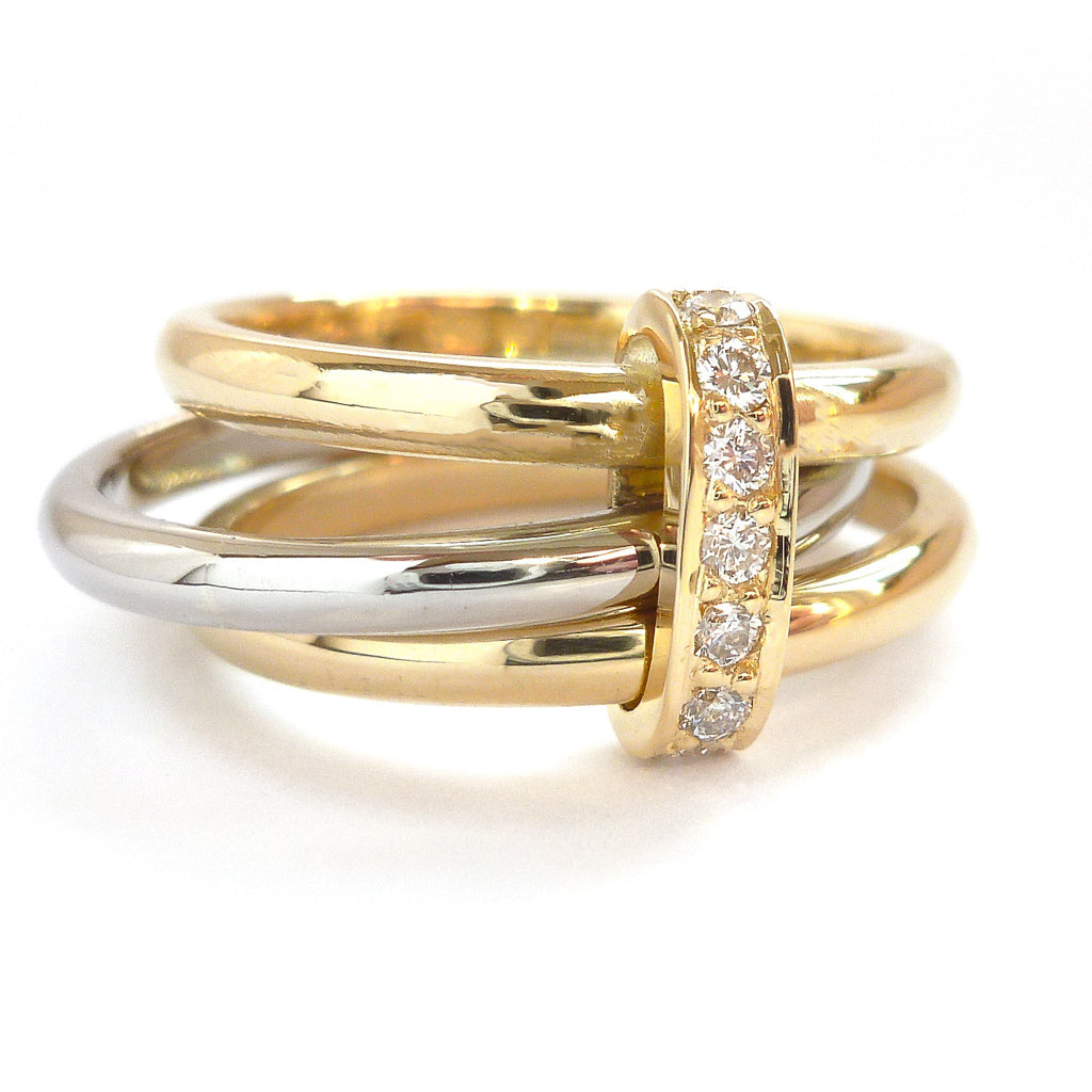 Three band gold and platinum ring with diamonds. Bespoke, contemporary and unique. Multi band ring or interlocking ring, sometimes called triple band rings too.