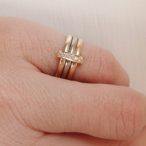 Three band gold and platinum ring with diamonds. Bespoke, contemporary and unique. Multi band ring or interlocking ring, sometimes called triple band rings too.