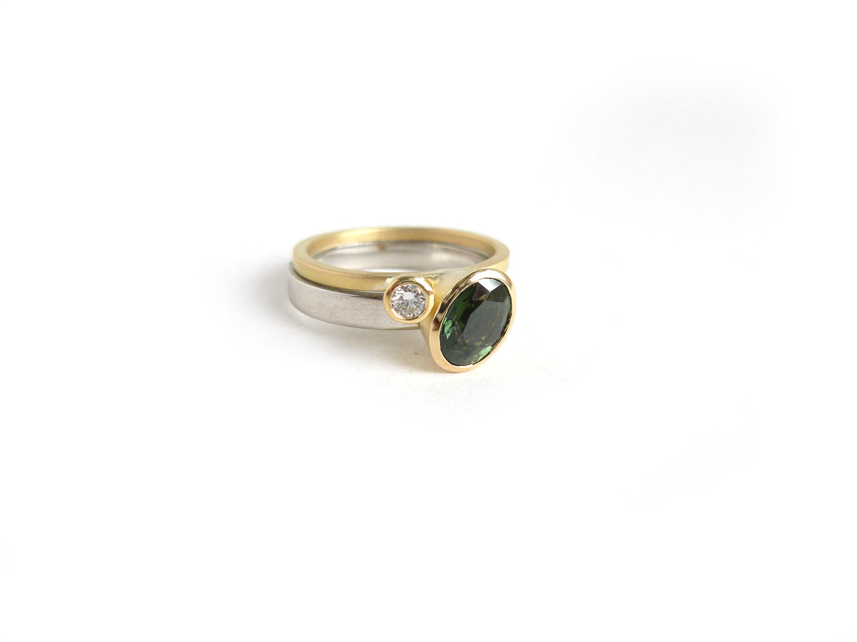 Green sapphire and diamond two band gold ring - unique and contemporary.