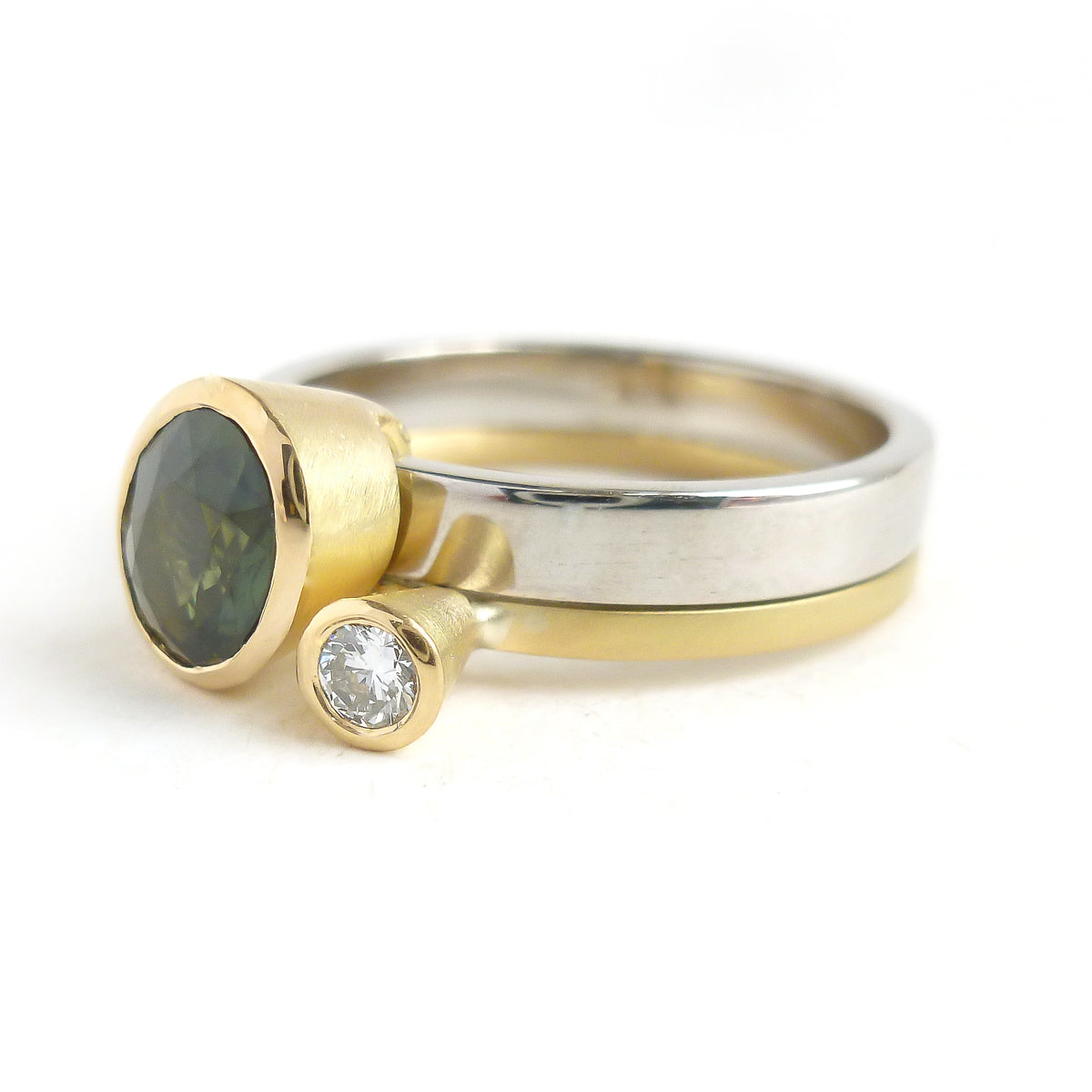 Green sapphire and diamond two band gold ring - unique and contemporary.