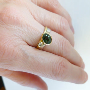 Green sapphire and diamond two band gold ring - unique and contemporary.