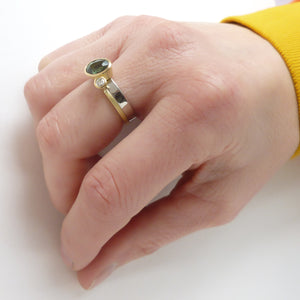 Green sapphire and diamond two band gold ring - unique and contemporary.