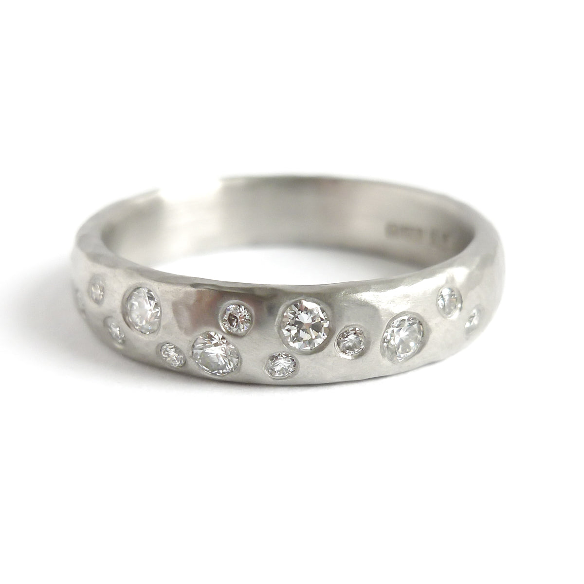 Hammered platinum and diamond ring - unique, handmade and bespoke.