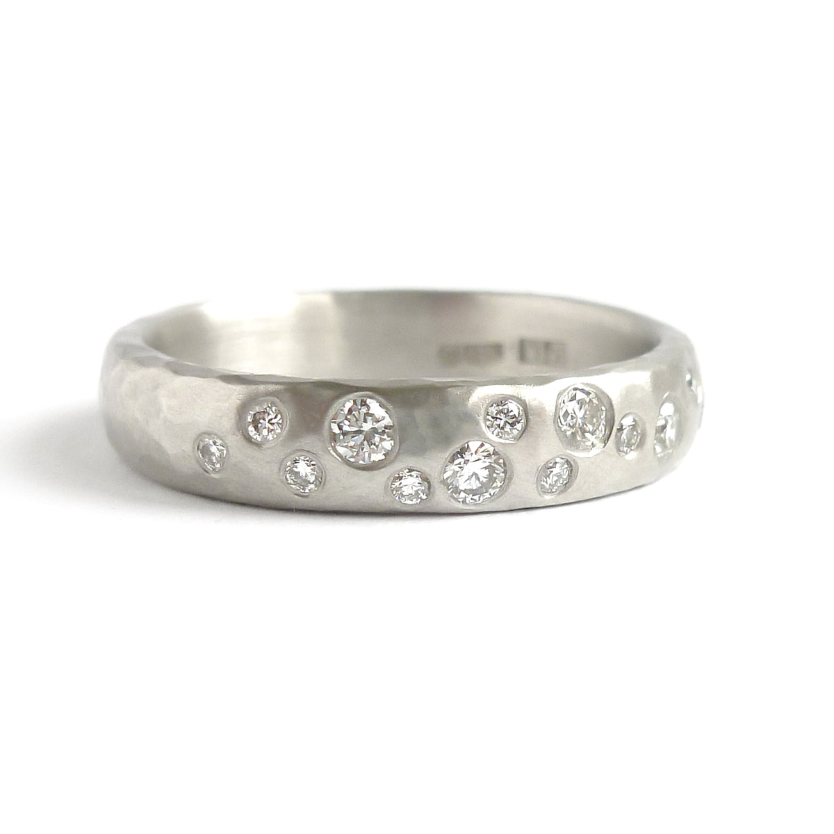 Hammered platinum and diamond ring - unique, handmade and bespoke.