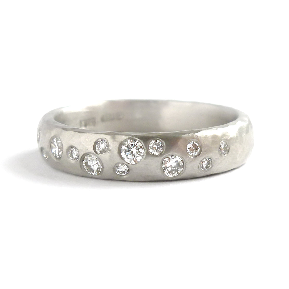 Hammered platinum and diamond ring - unique, handmade and bespoke.