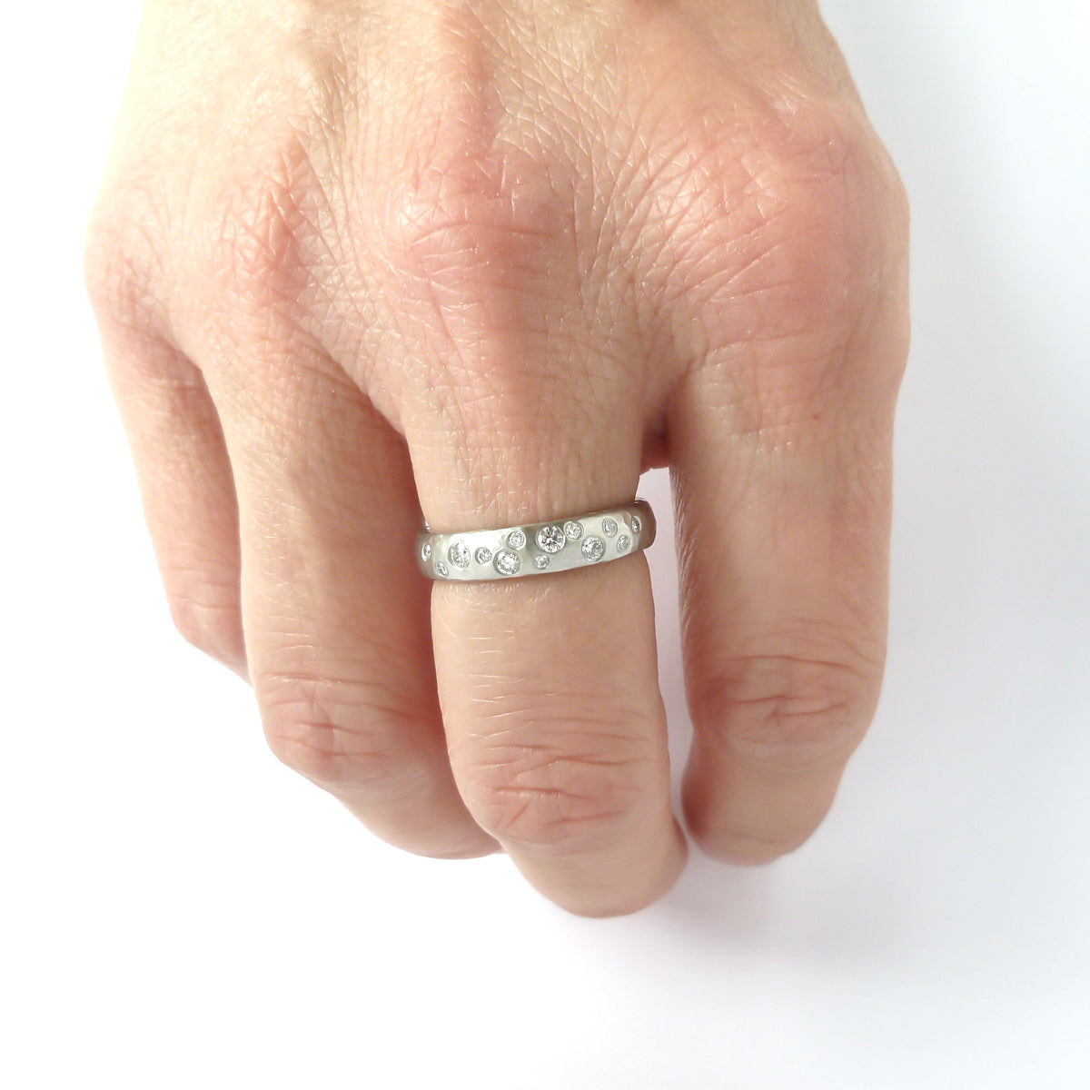 Hammered platinum and diamond ring - unique, handmade and bespoke.