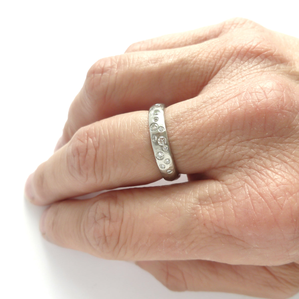Hammered platinum and diamond ring - unique, handmade and bespoke.