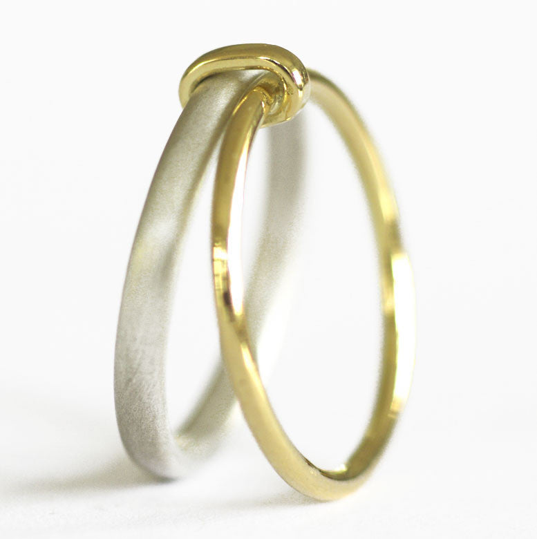 Unusual, unique, bespoke and modern women's/men’s wedding ring in silver and gold. Handmade by Sue Lane Jewellery in Herefordshire, UK. Unique wedding ring.