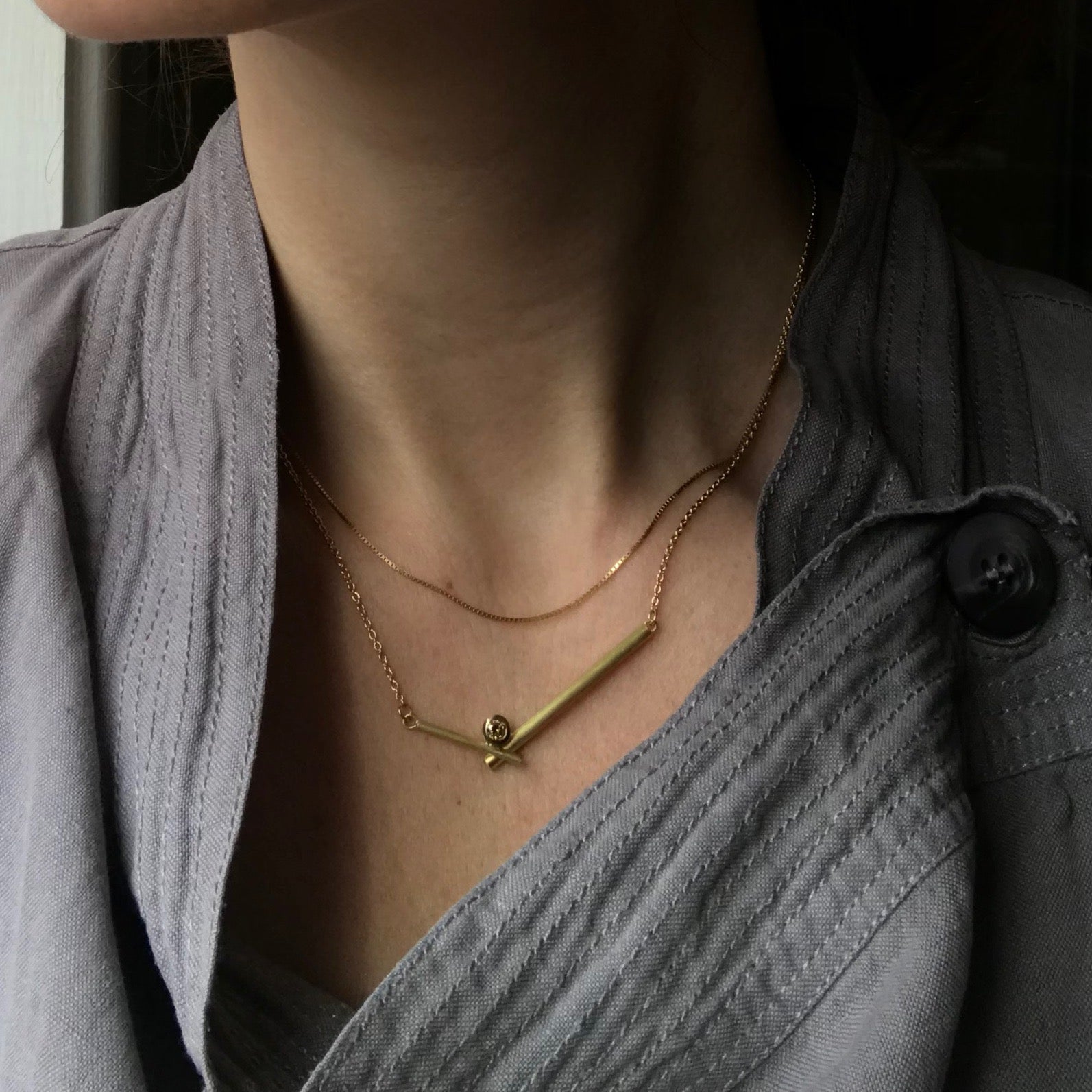 modern yellow gold and diamond stacking necklace perfect on its own or with your own chains