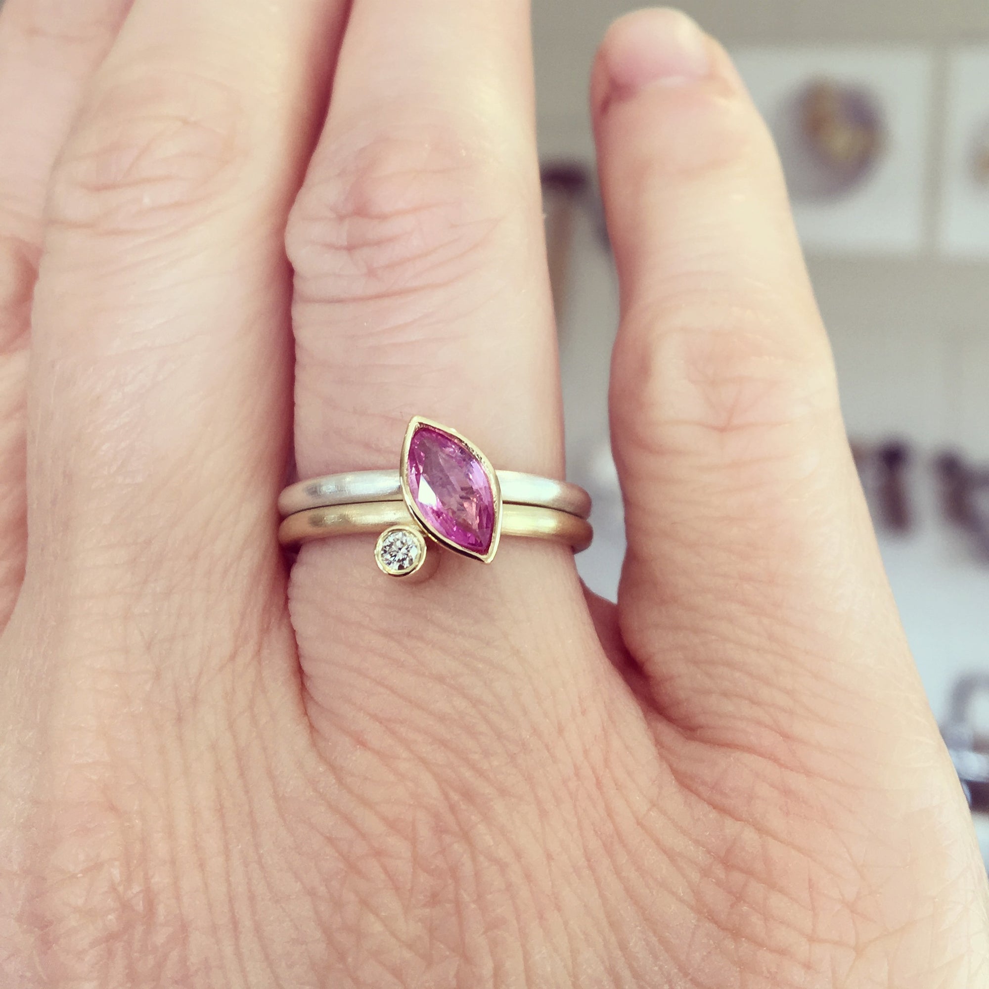 brushed silver and gold modern ring with pink sapphire and diamond 