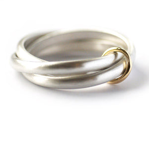 Unusual, unique, bespoke and modern silver "Russian Wedding ring" playful and tactile with brushed finish. Handmade by Sue Lane Contemporary Jewellery UK. 