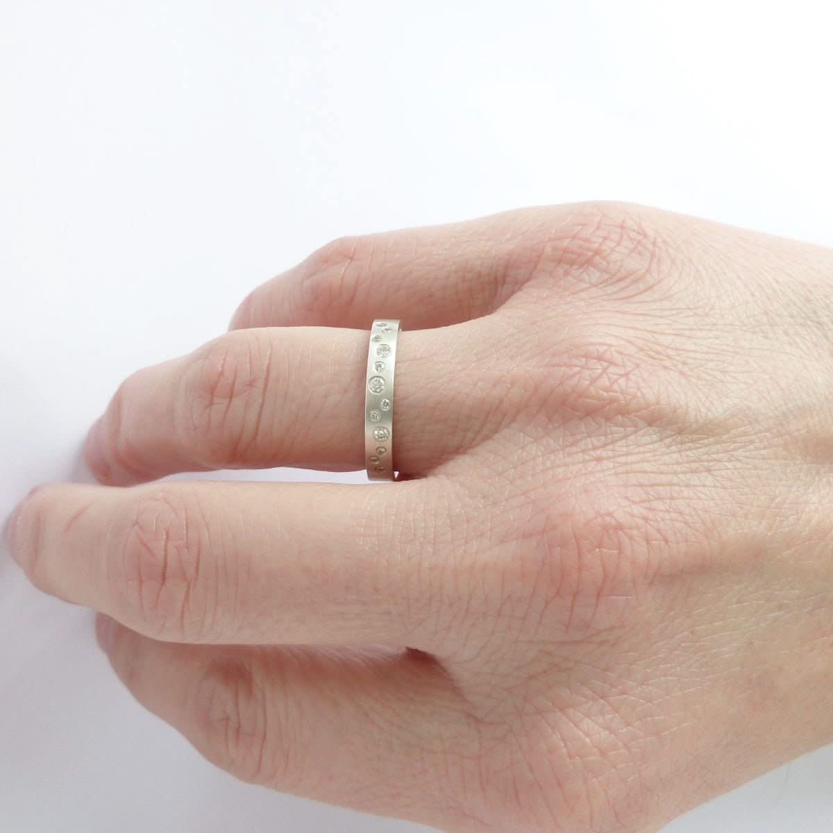 Modern diamond eternity ring handmade by Sue Lane