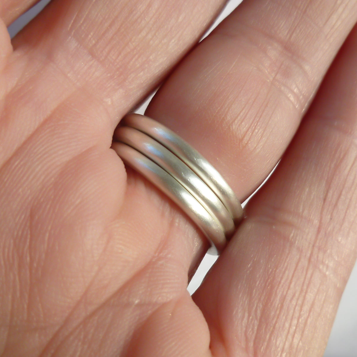 Modern unique and bespoke contemporary silver gold and diamond two band stacking ring by Sue Lane